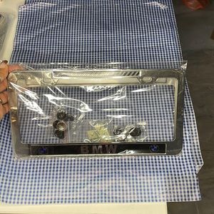 BMW license plate holder brand new never used in package